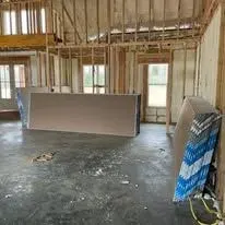 Closed-cell spray foam insulation covering a crawlspace rim joist